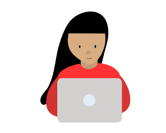 A woman sits working at a laptop