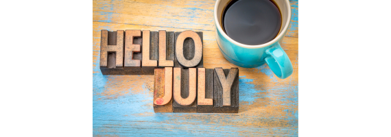 Hello July - a word abstract in vintage letterpress wood type blocks against a grunge wooden background with a cup of coffee