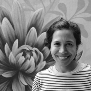 A black and white headshot of María Sol Ruiz, joining as Champions Fellow to support the PREreview team